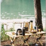 A table with coffee and other items on it