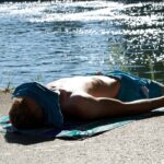 swimming trunks, bath towel, on the water