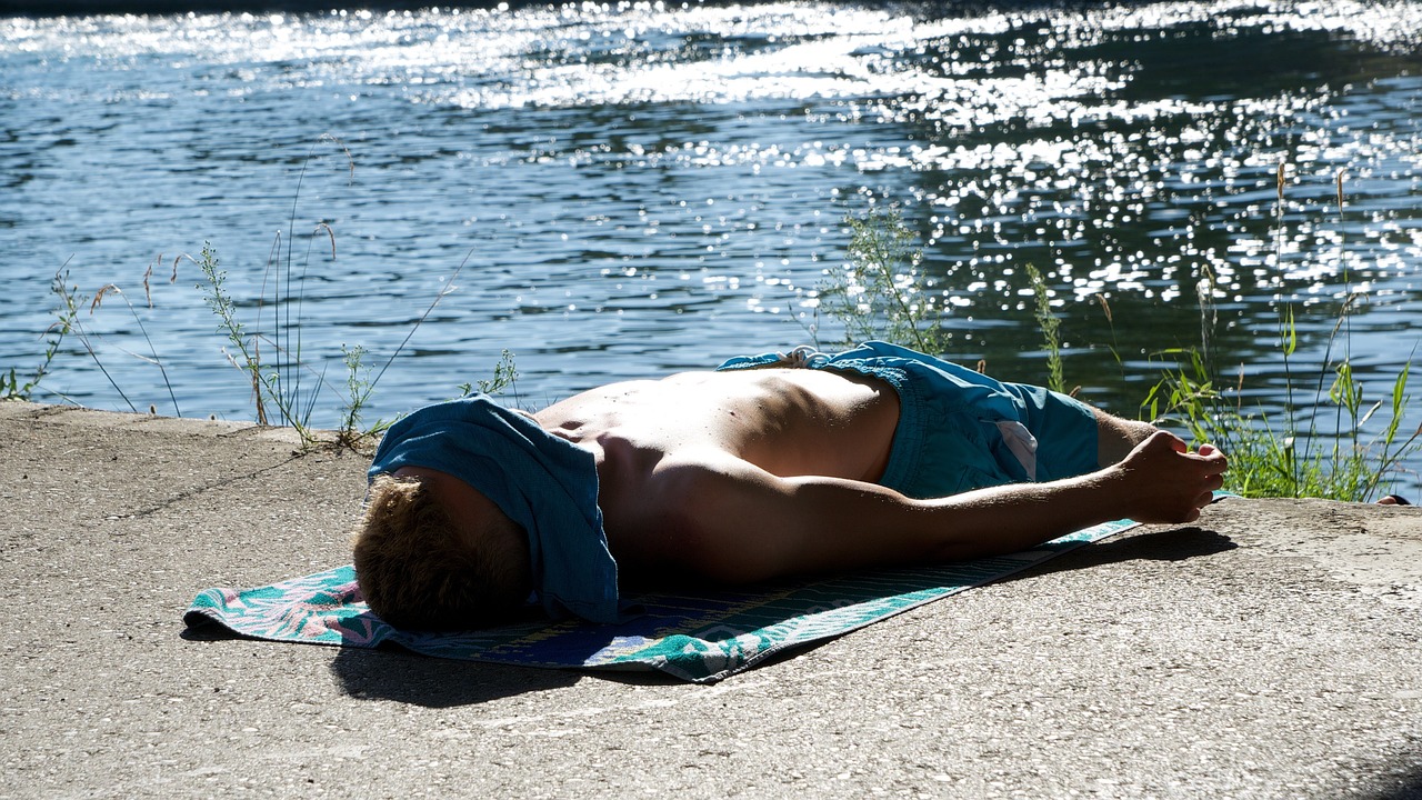 swimming trunks, bath towel, on the water