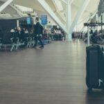 unattended black luggage inside airport