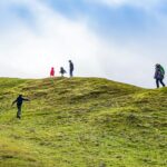 several people on mountain top