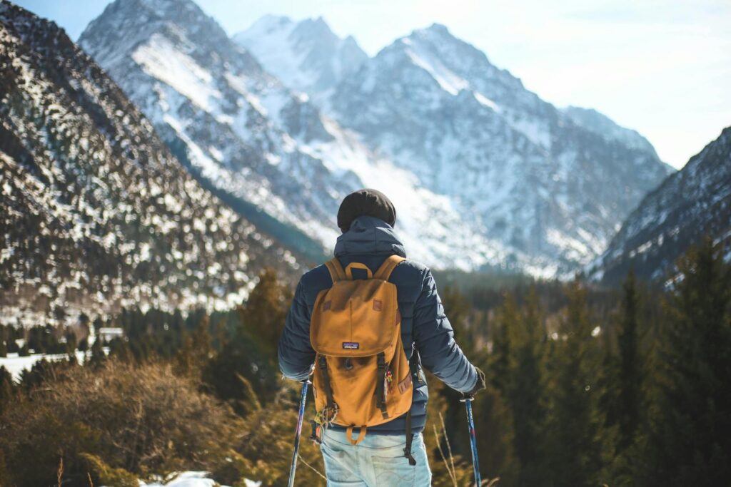 Men's Blue Leather Jacket and Brown Backpack