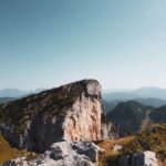 a person standing on top of a mountain